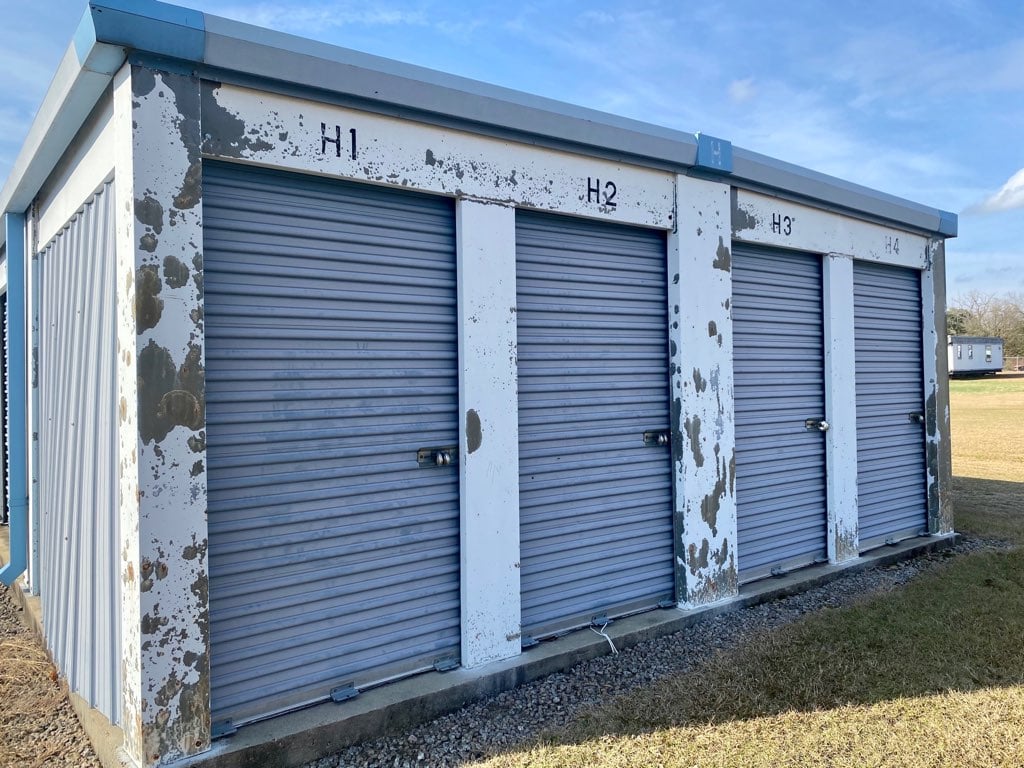 Old Facility with Damaged Self-Storage Doors