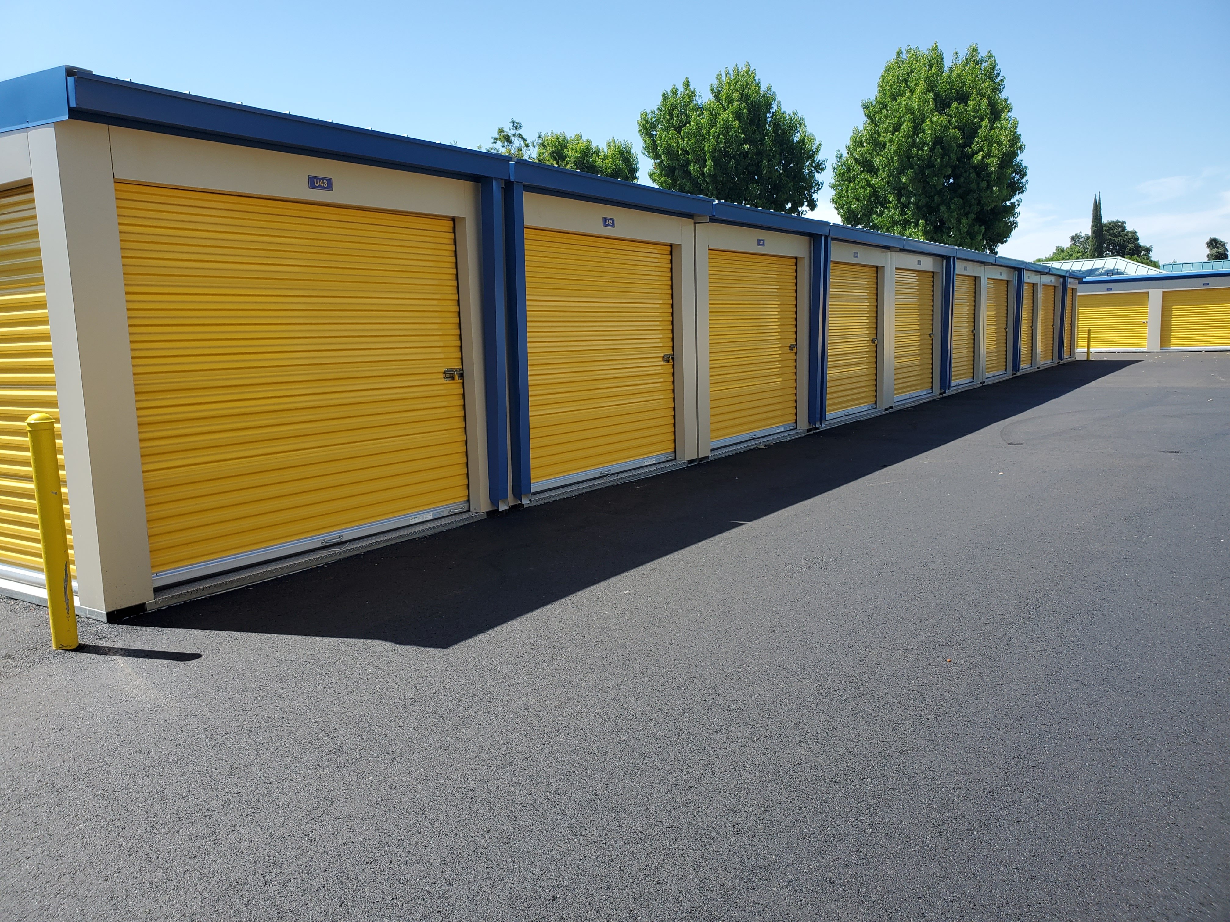 Yellow and blue MASS relocatable storage units