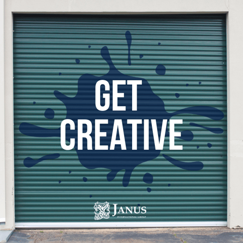 green self-storage door with "get creative" text and Janus branded logo