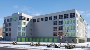 Multi-story self-storage facility with faux windows on every floor