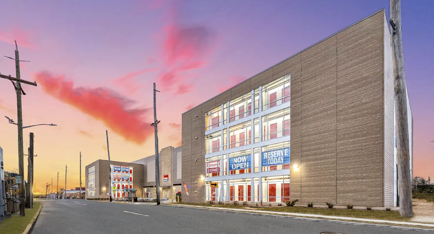 Multi-story Trojan Storage facility in Englewood, NJ, at dusk