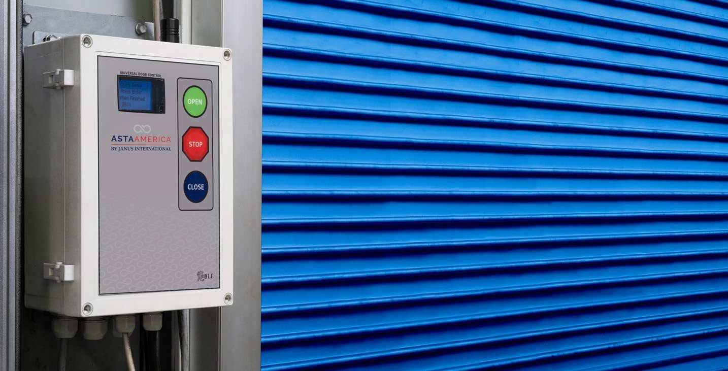 Janus high performance control box beside a rolling steel curtain