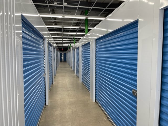 Blue Self-Storage Doors with NokeONE locks at CubeNow Self-Storage