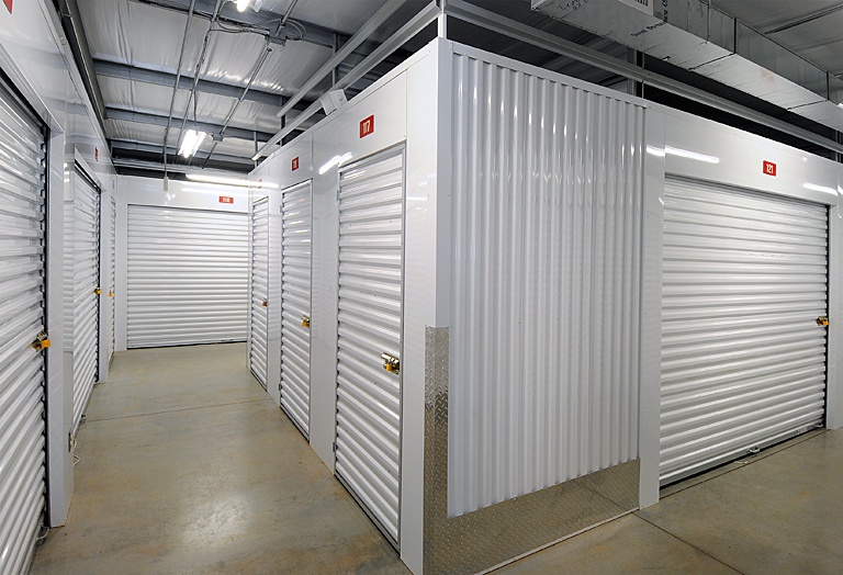 Inside of a Self-Storage Facility with White Unit Doors