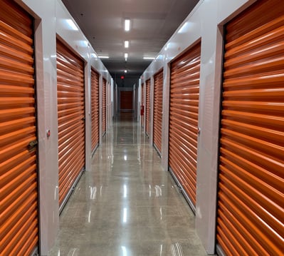 Janus orange self-storage doors with smart entry system