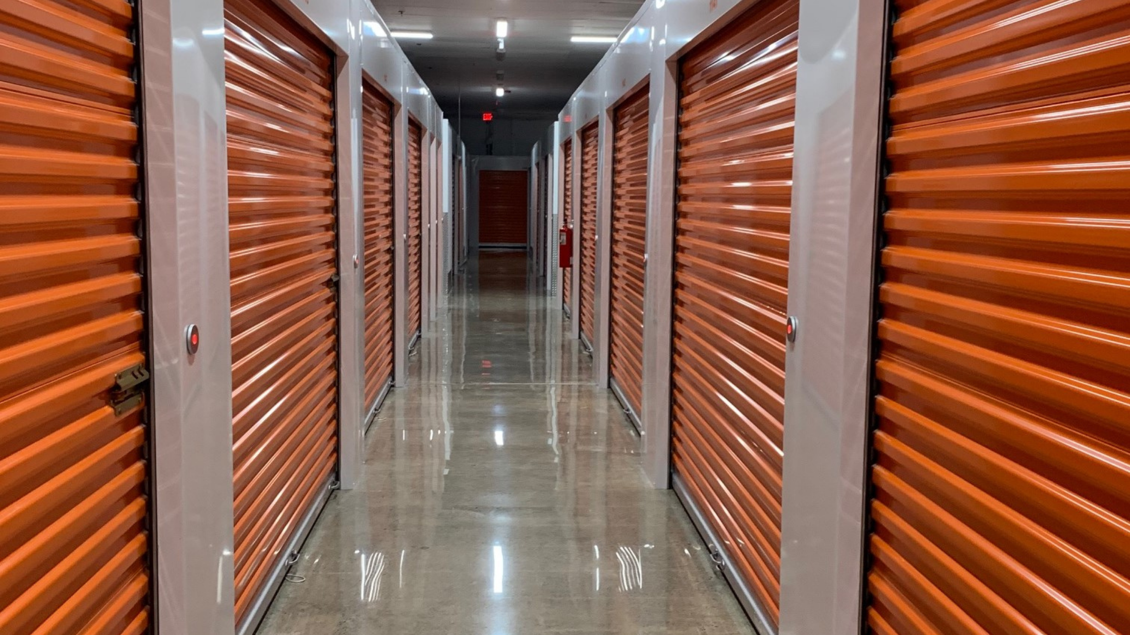 Orange Self-Storage Doors in Hallway