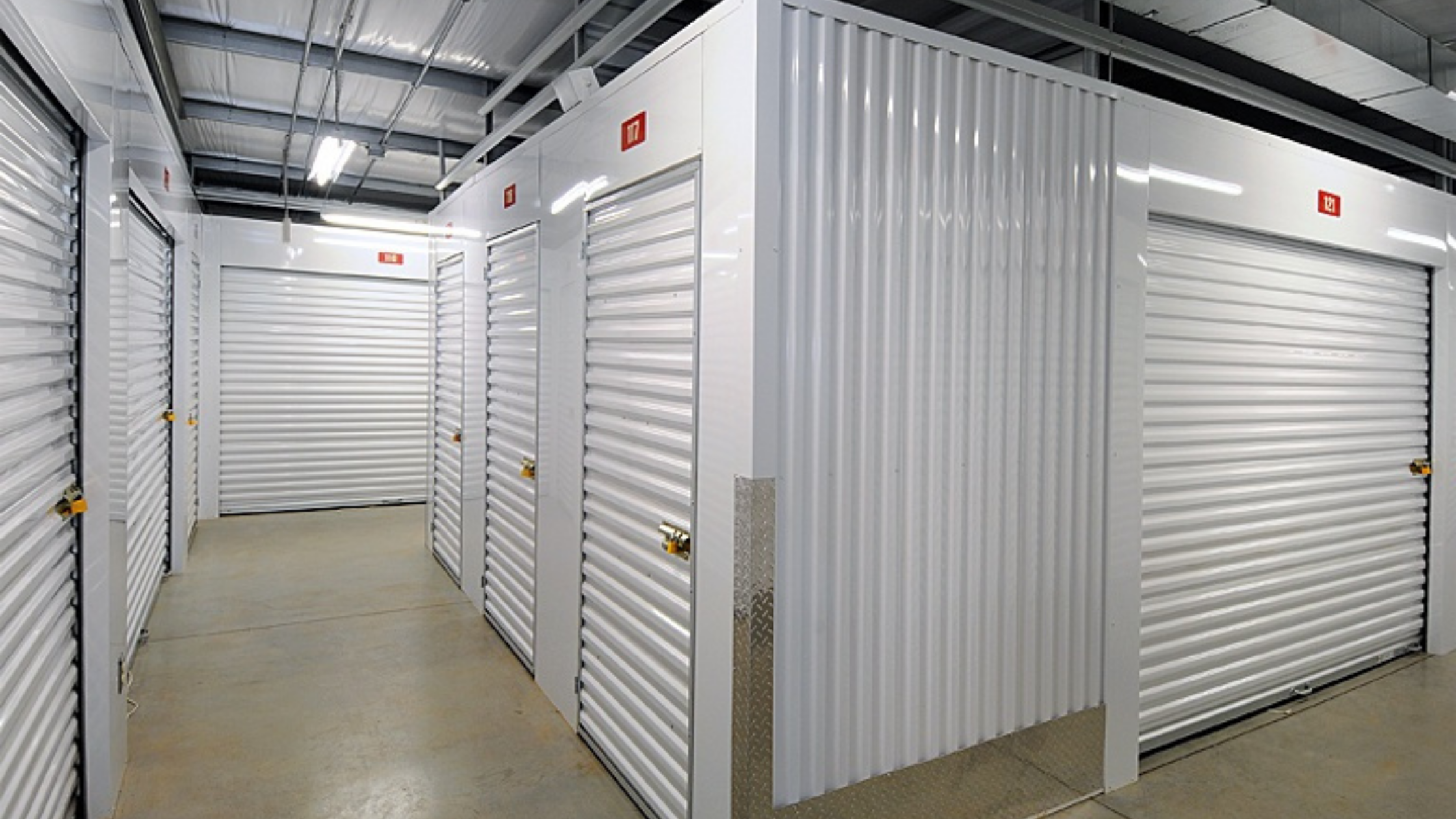 self storage hallway with white doors