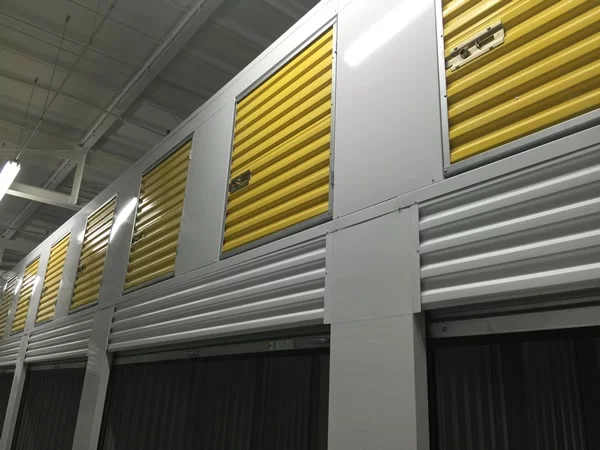 Roll up doors with yellow storage lockers above